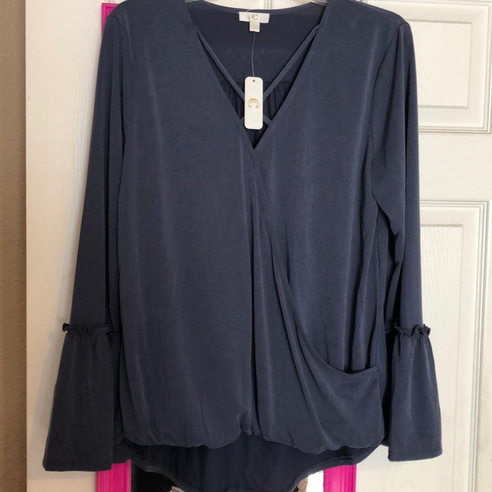 Charming Charlie blue long sleeve crisscross top